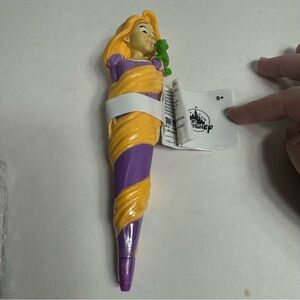NWT. Disney Rapunzel pen. All wrapped up in her golden hair